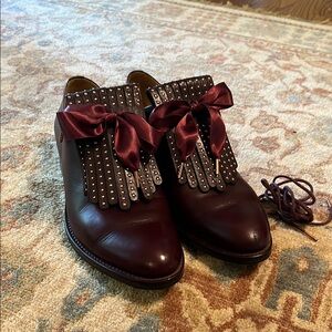 Burgundy Leather Flats with Classic Brogue Design